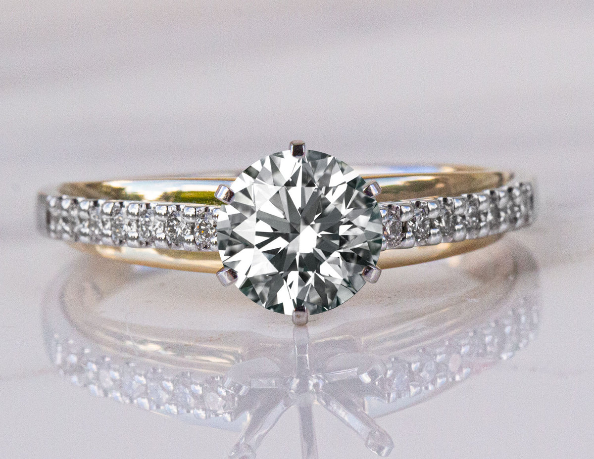 1/7ct. t.w. Diamond Engagement Ring in 14K Yellow and White Gold