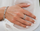 1/10ct. t.w. Diamond Oval Link Fashion Ring in Sterling Silver