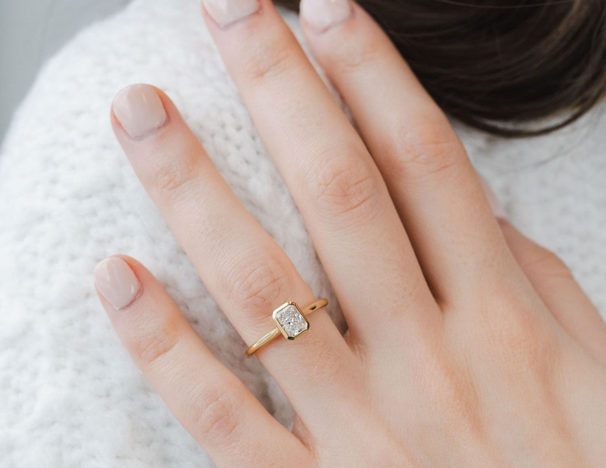 3/4ct. Radiant Cut Newborn Lab Created Bezel Solitaire Engagement Ring in 14K Yellow Gold