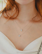 1/6ct. t.w. Cushion Shape Newborn Lab Created Diamond Fashion Pendant in Sterling Silver