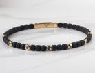 1/4ct. t.w. Black Diamond Bangle Bracelet in Titanium and 14K Yellow Gold