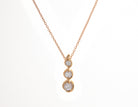 1/5ct. t.w. 3-Stone Diamond Infinity Pendant in 10K Yellow Gold