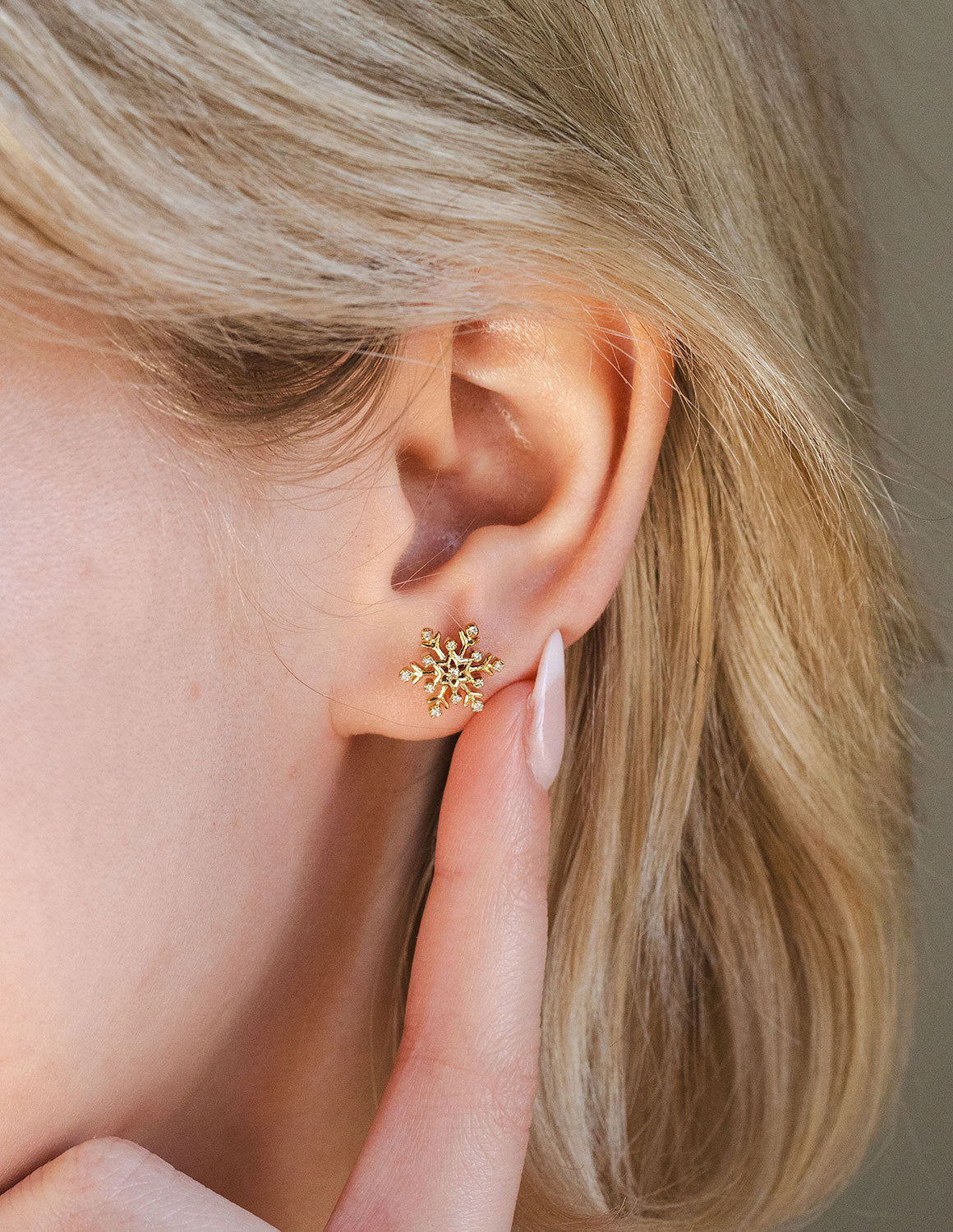 1/10ct. t.w. Diamond Snowflake Earrings in 10K Yellow Gold