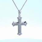 1/10ct. t.w. Diamond Cross Pendant in Sterling Silver