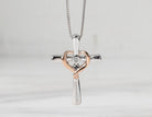 .02ct. Diamond Cross and Heart Pendant in 10K Rose Gold and Sterling Silver