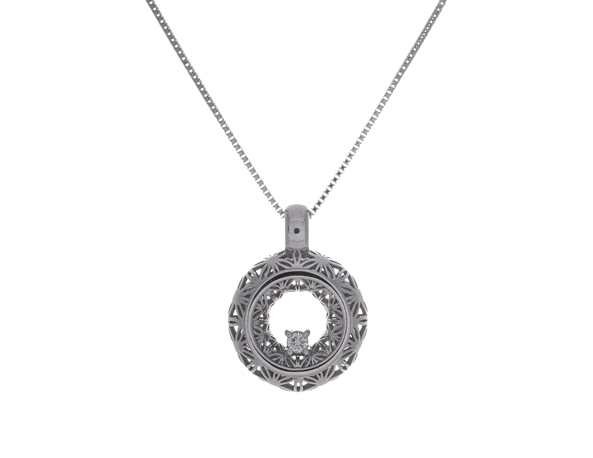 1/14ct. Diamond Puffed Pendant in Sterling Silver