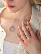 1/8ct. t.w. Diamond Circle Pendant in Sterling Silver