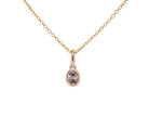 1/7ct. Brown Oval Cut Bezel Set Diamond Pendant in 14K Yellow Gold