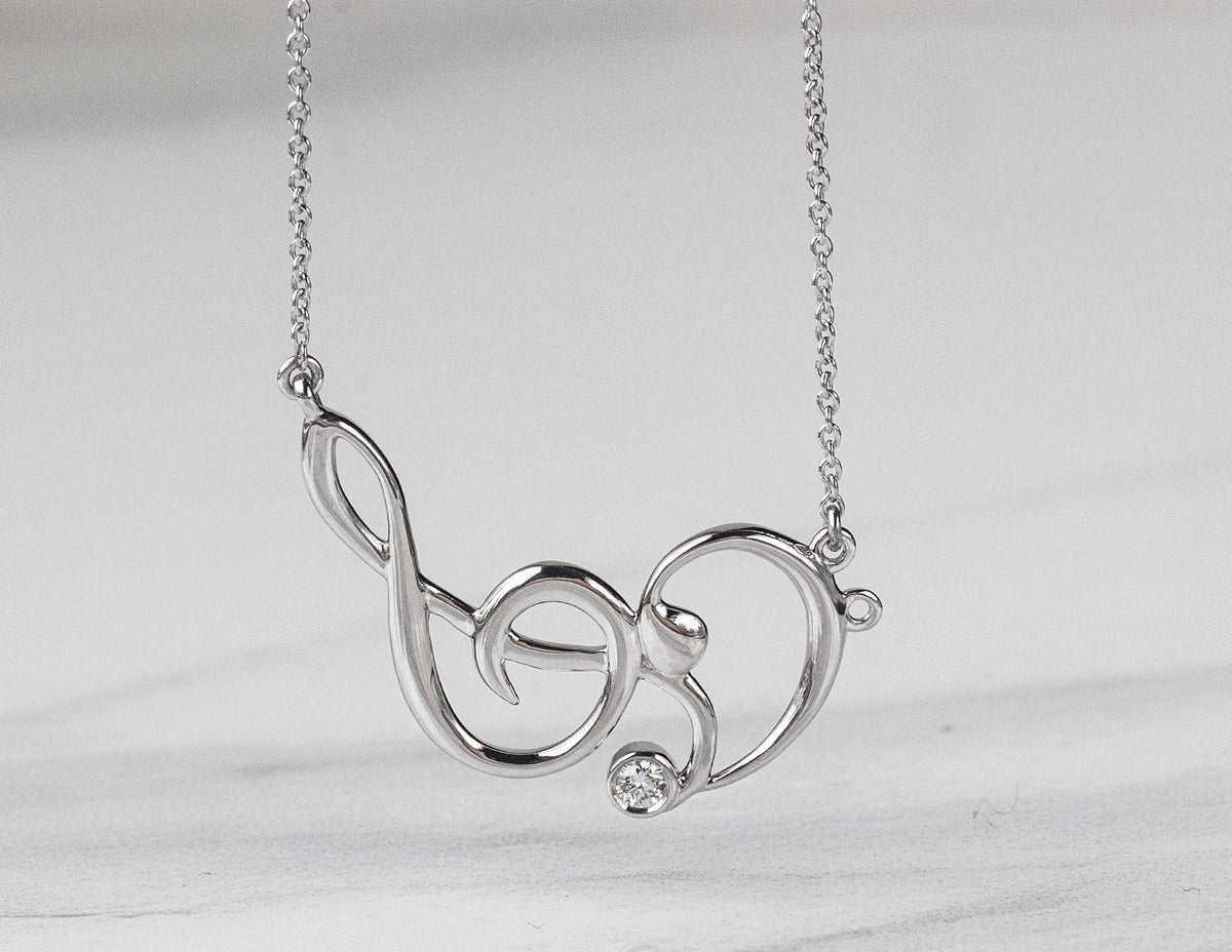 .04ct. Newborn Lab Created Diamond Musical Note Pendant in Sterling Silver