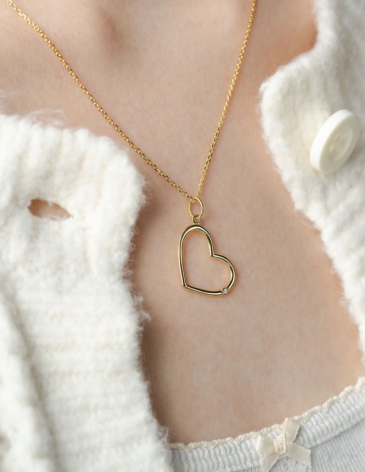 .01ct. Diamond Open Heart Pendant in 14K Yellow Gold
