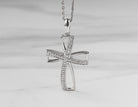 .03ct. t.w. Diamond Cross Pendant in Sterling Silver