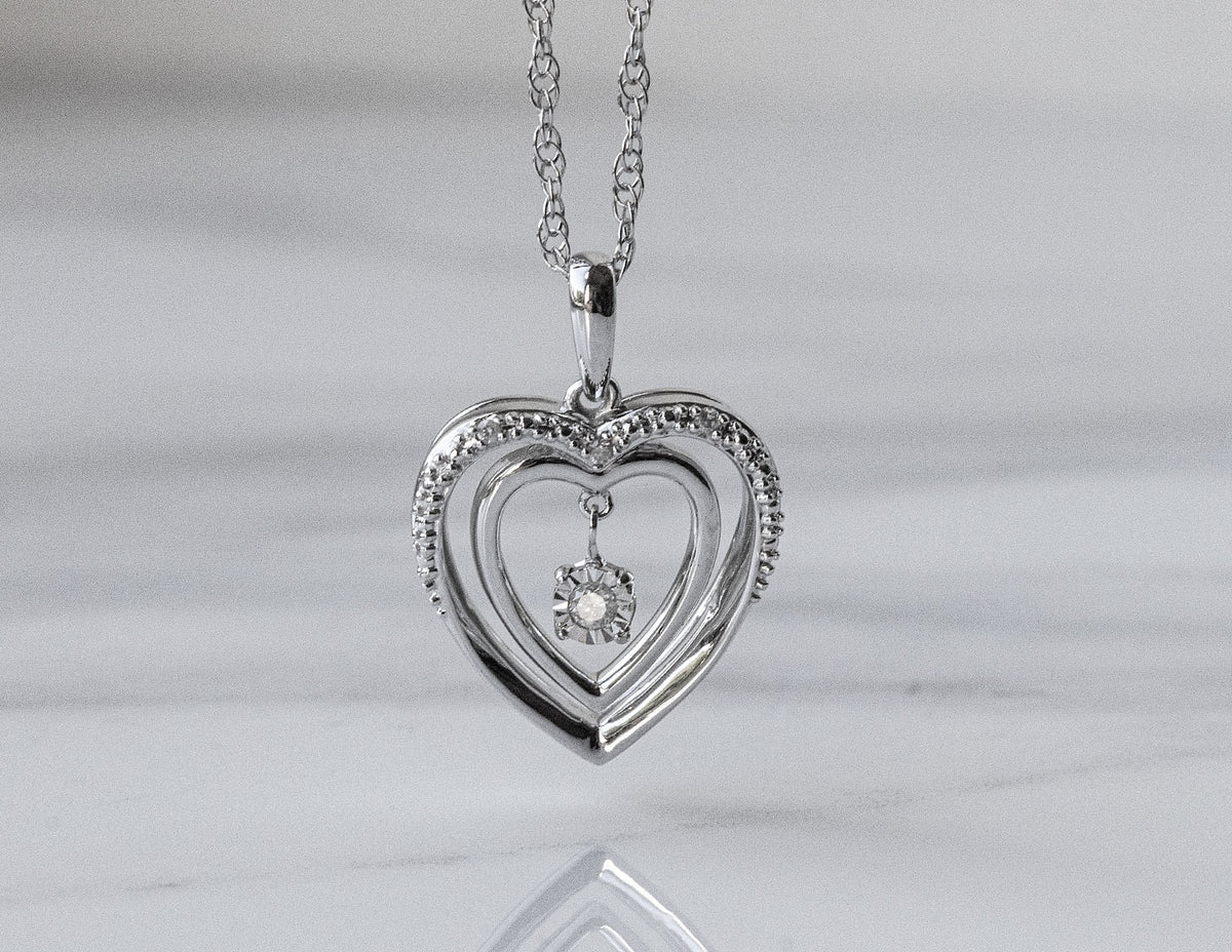 .03ct. t.w. Round Cut Shimmering Diamond Heart Pendant in Sterling Silver
