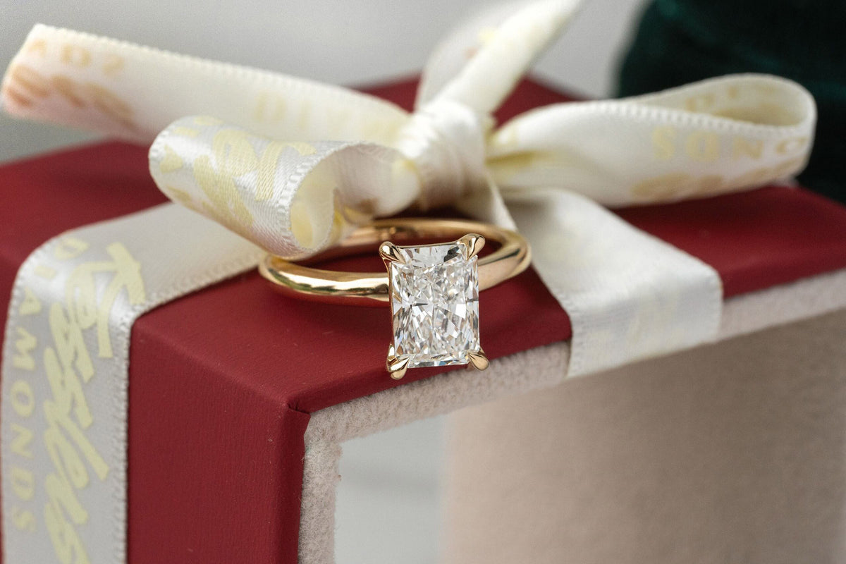 Jeweler appraising a diamond ring