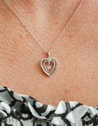 .03ct. t.w. Round Cut Shimmering Diamond Heart Pendant in Sterling Silver
