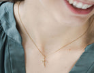 1/4ct. t.w. Diamond Cross Pendant in 10K Yellow Gold