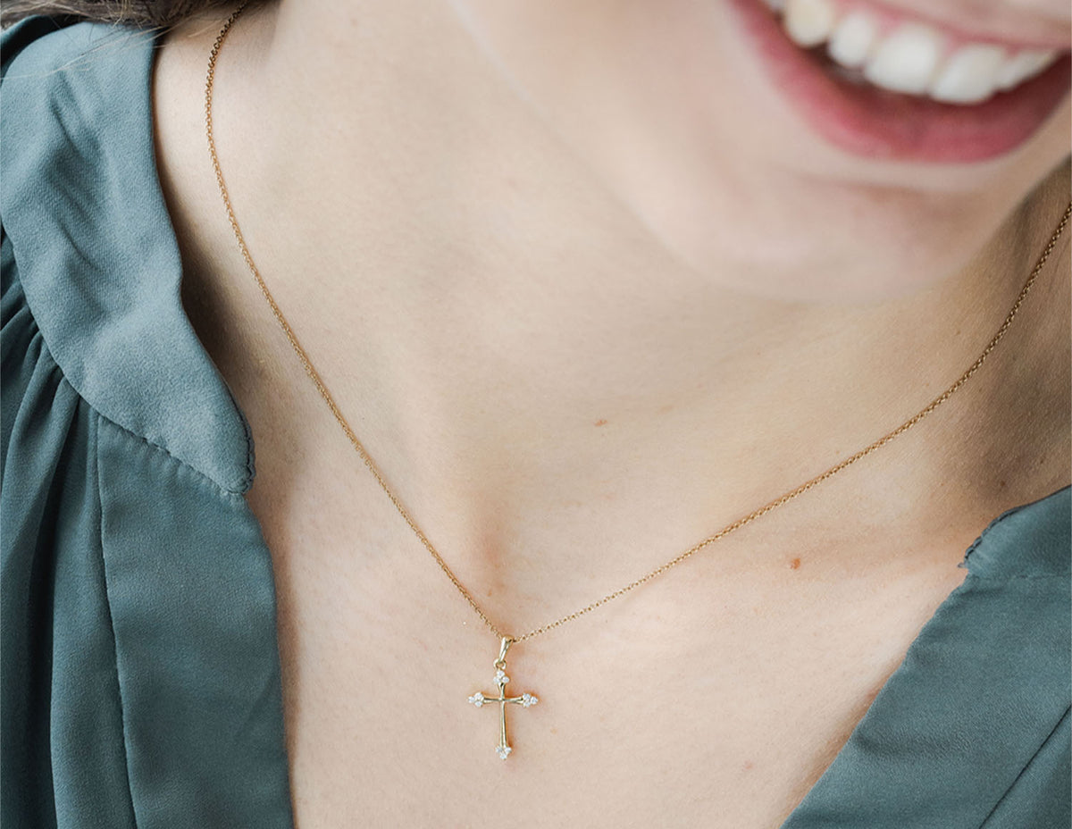 1/4ct. t.w. Diamond Cross Pendant in 10K Yellow Gold