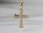 1/10ct. t.w. Diamond Cross Pendant in 10K Yellow Gold