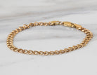7" Solid Curb Charm Bracelet in 14K Yellow Gold
