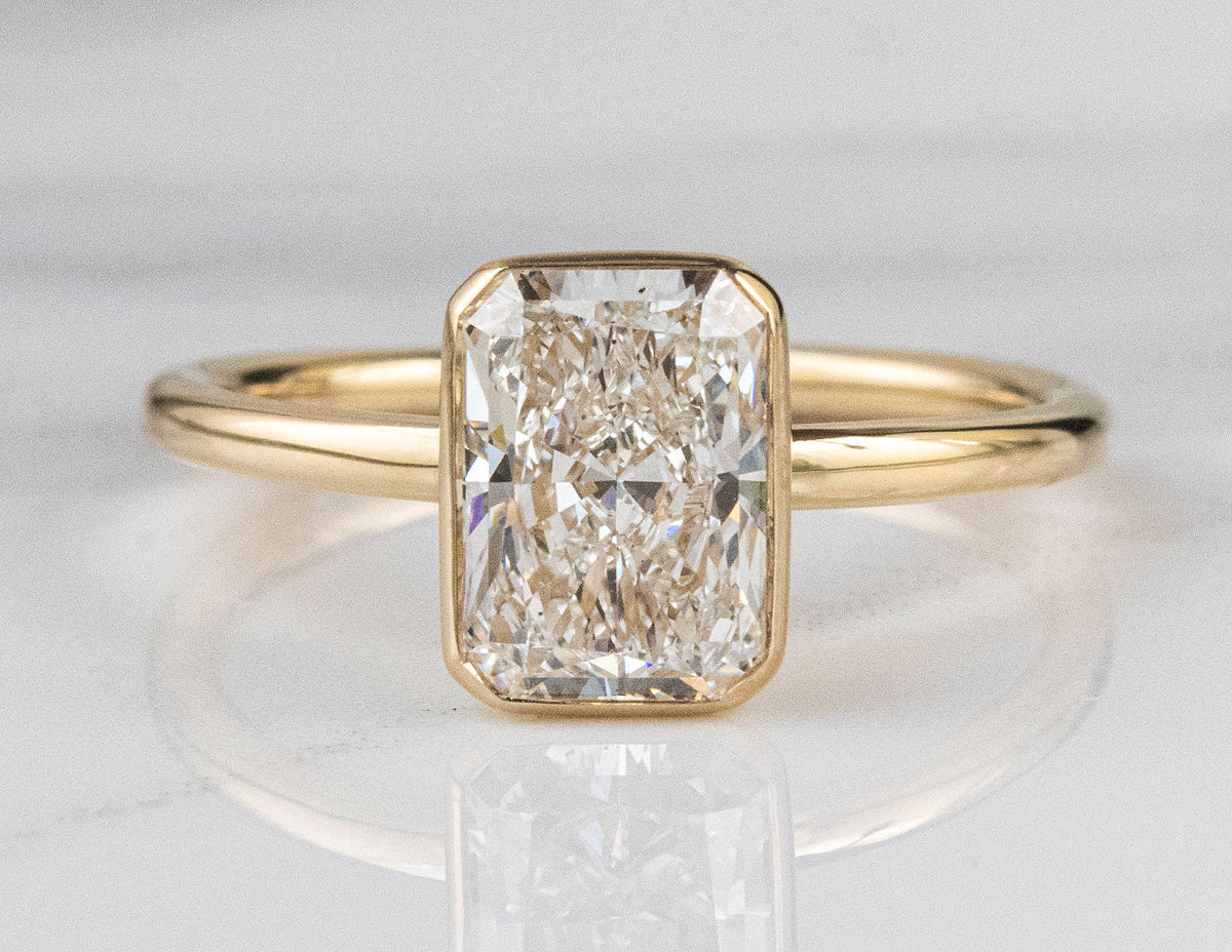 2ct. Radiant Cut Newborn Lab Created Diamond Engagement Ring in 14K Yellow Gold