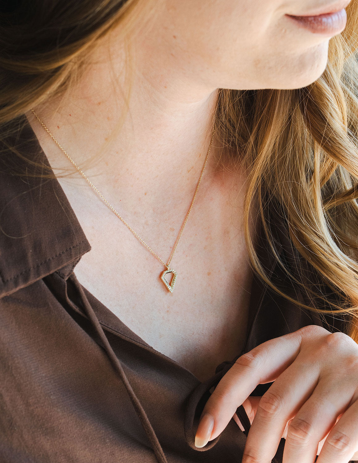 1/8ct. t.w. Diamond Pendant in 10K Yellow Gold