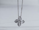 .02ct. Diamond Flower Pendant in Sterling Silver
