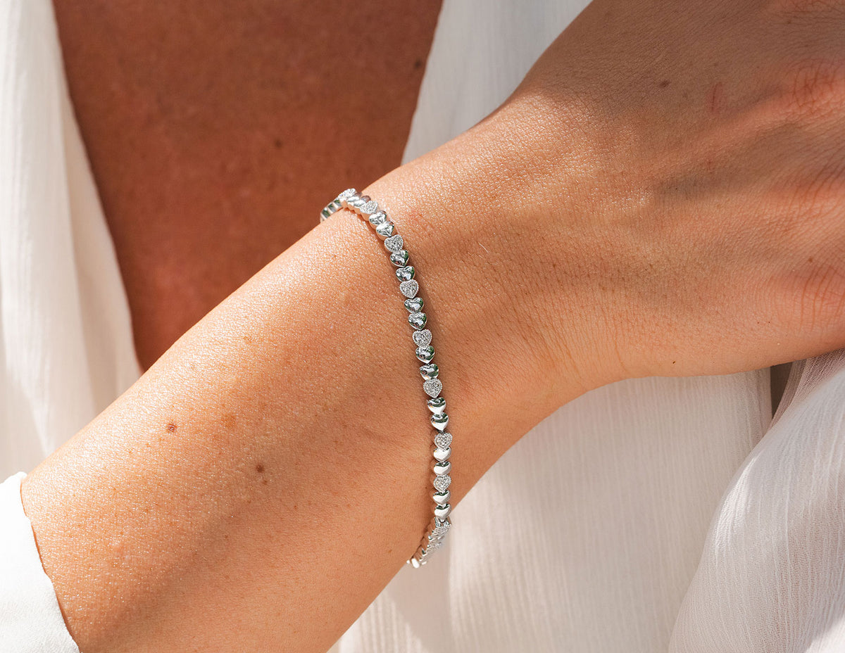 1/7ct. t.w. Diamond Heart Bracelet in Sterling Silver
