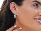 1/10ct. t.w. Diamond Oval Link Earrings in Sterling Silver