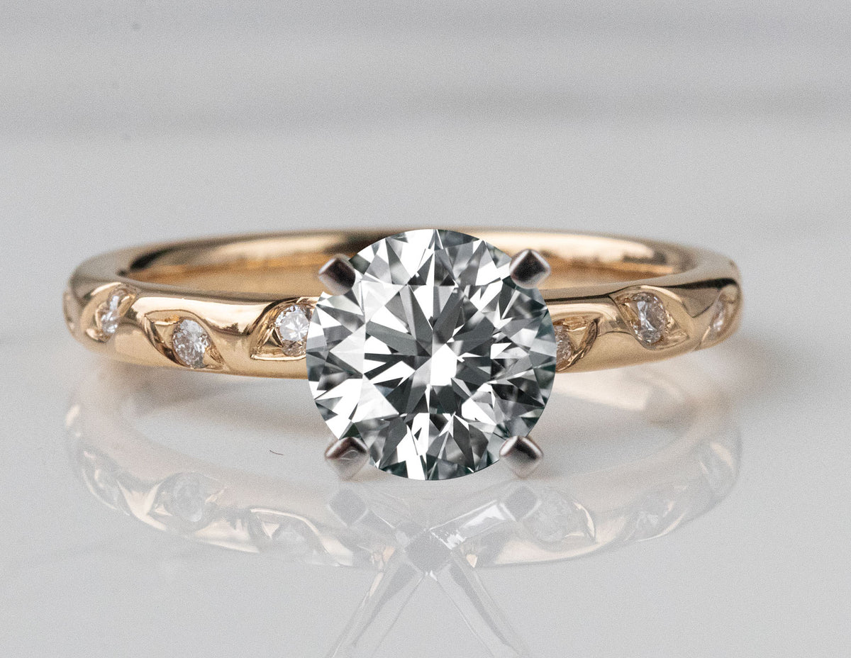 1/10ct. t.w. Diamond Engagement Ring in 14K Yellow Gold