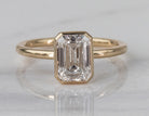 2ct. Emerald Cut Newborn Lab Created Diamond Bezel Engagement Ring in 14K Yellow Gold