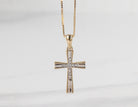 .05ct. t.w. Diamond Cross Pendant in 10K Yellow Gold
