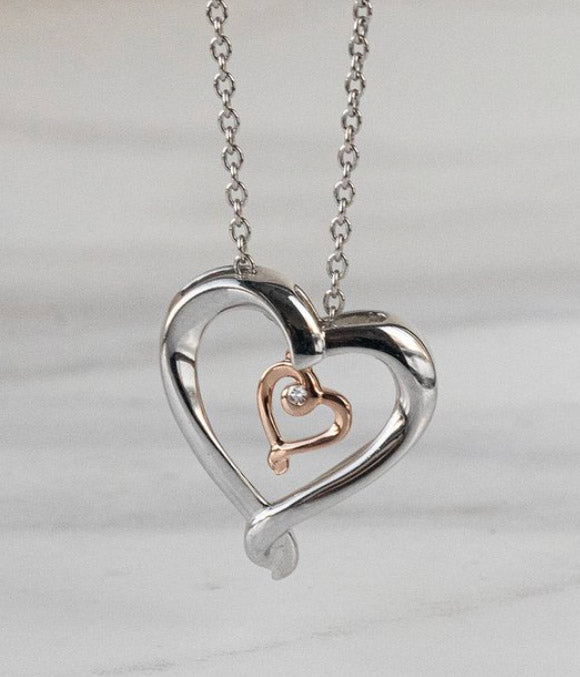 Kissing Hearts diamond pendant