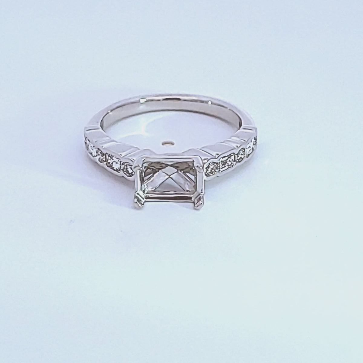 1/2ct. t.w. Emerald and Round Cut Diamond Engagement Ring in 14K White Gold