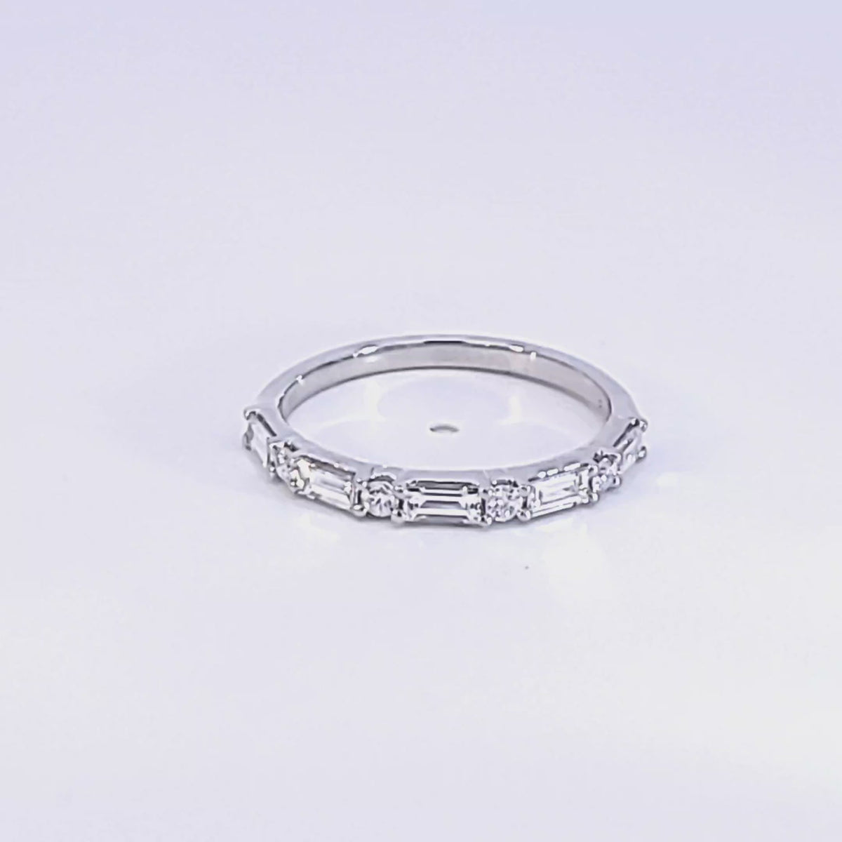 1/2ct. t.w. Baguette and Round Cut Diamond Anniversary Ring in 14K White Gold