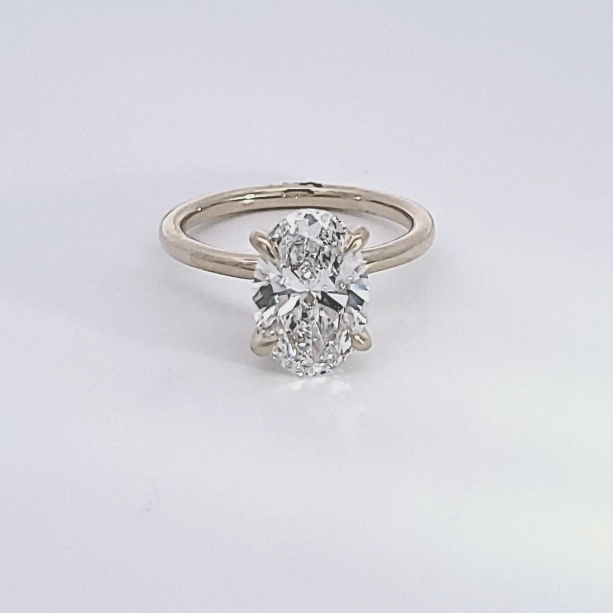 3 1/14ct. t.w. Oval Cut Newborn Lab Created Diamond Engagement Ring in 14K Yellow Gold