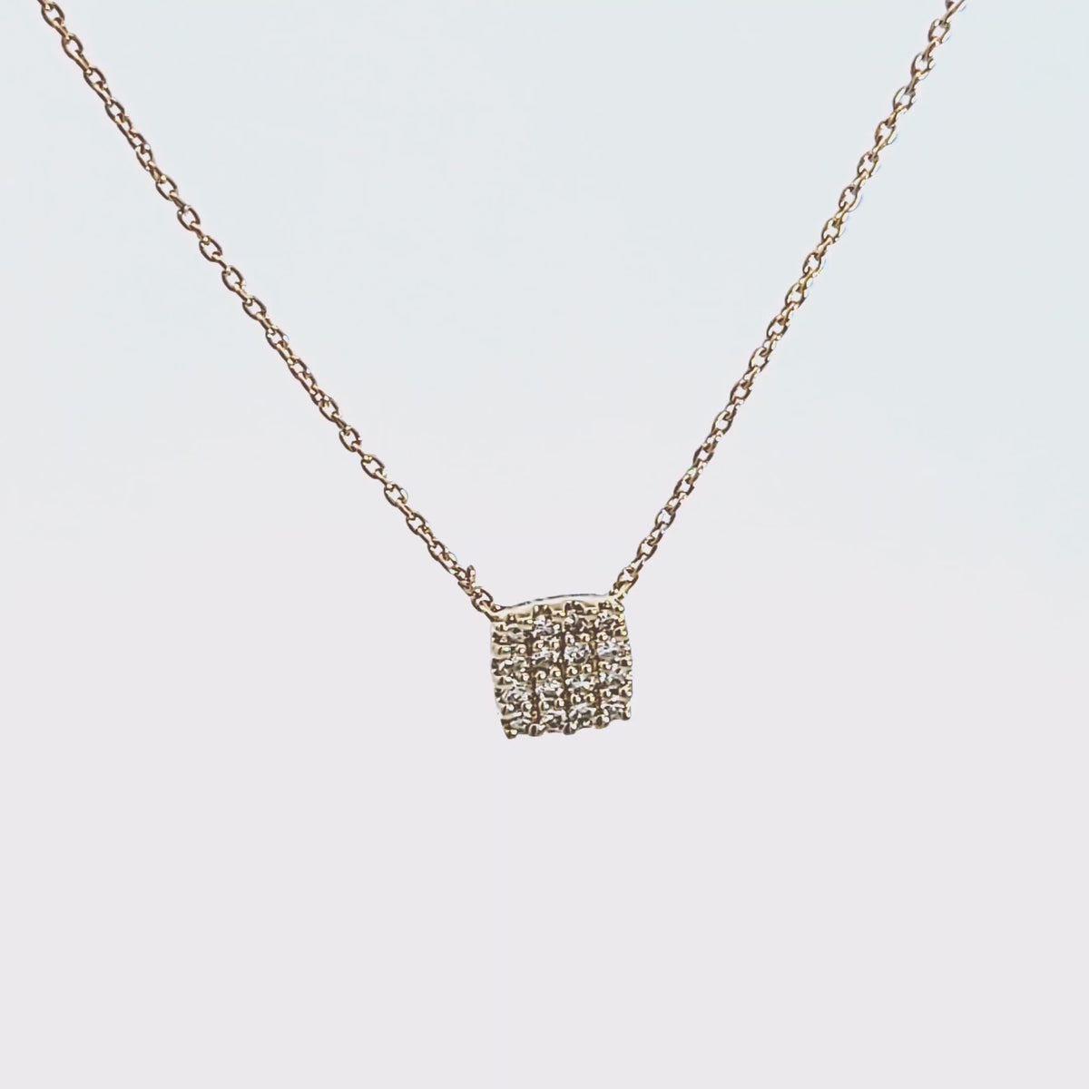 1/8ct. t.w. Diamond Cushion Pendant in 10K Yellow Gold