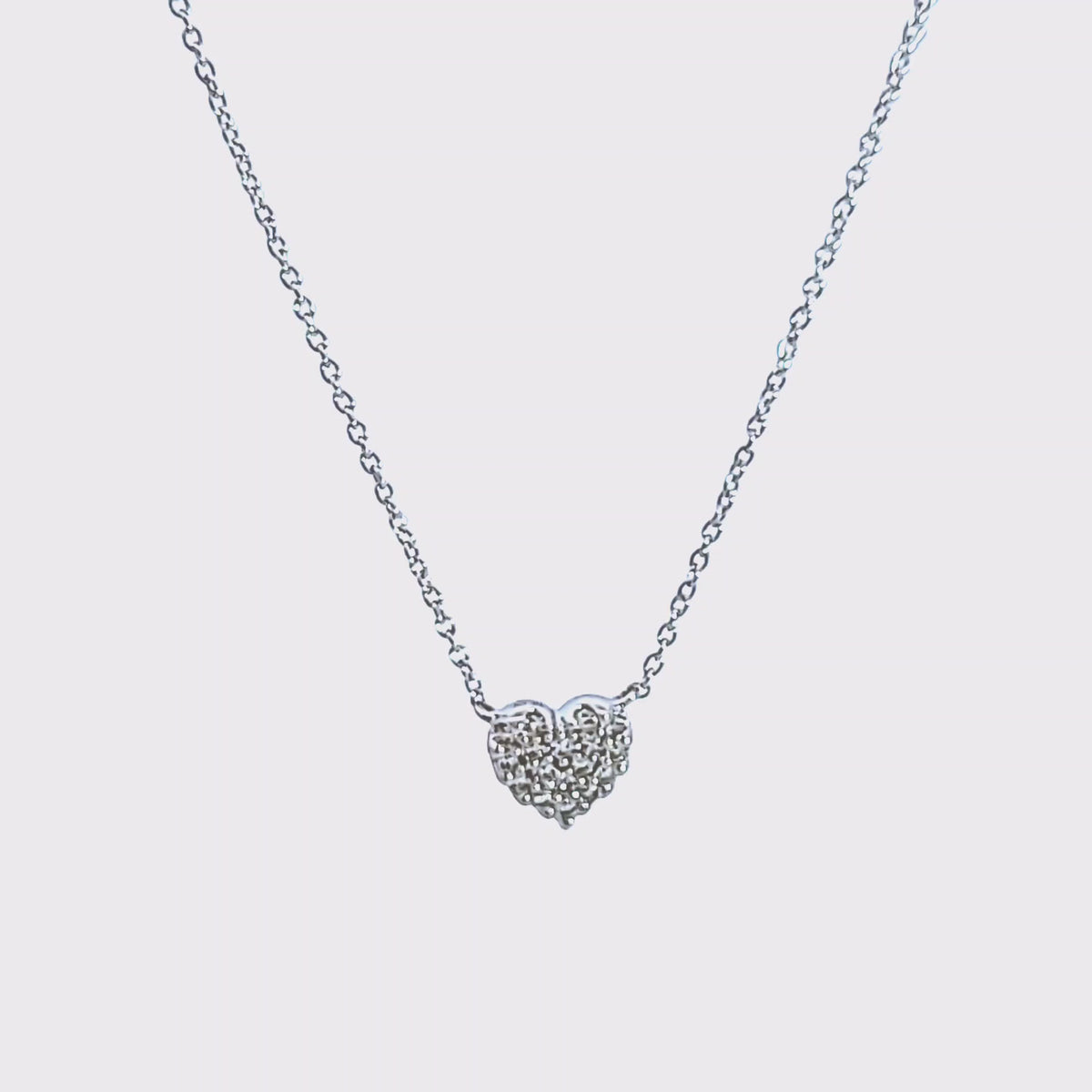 1/10ct. t.w. Diamond Heart Pendant in 10K White Gold