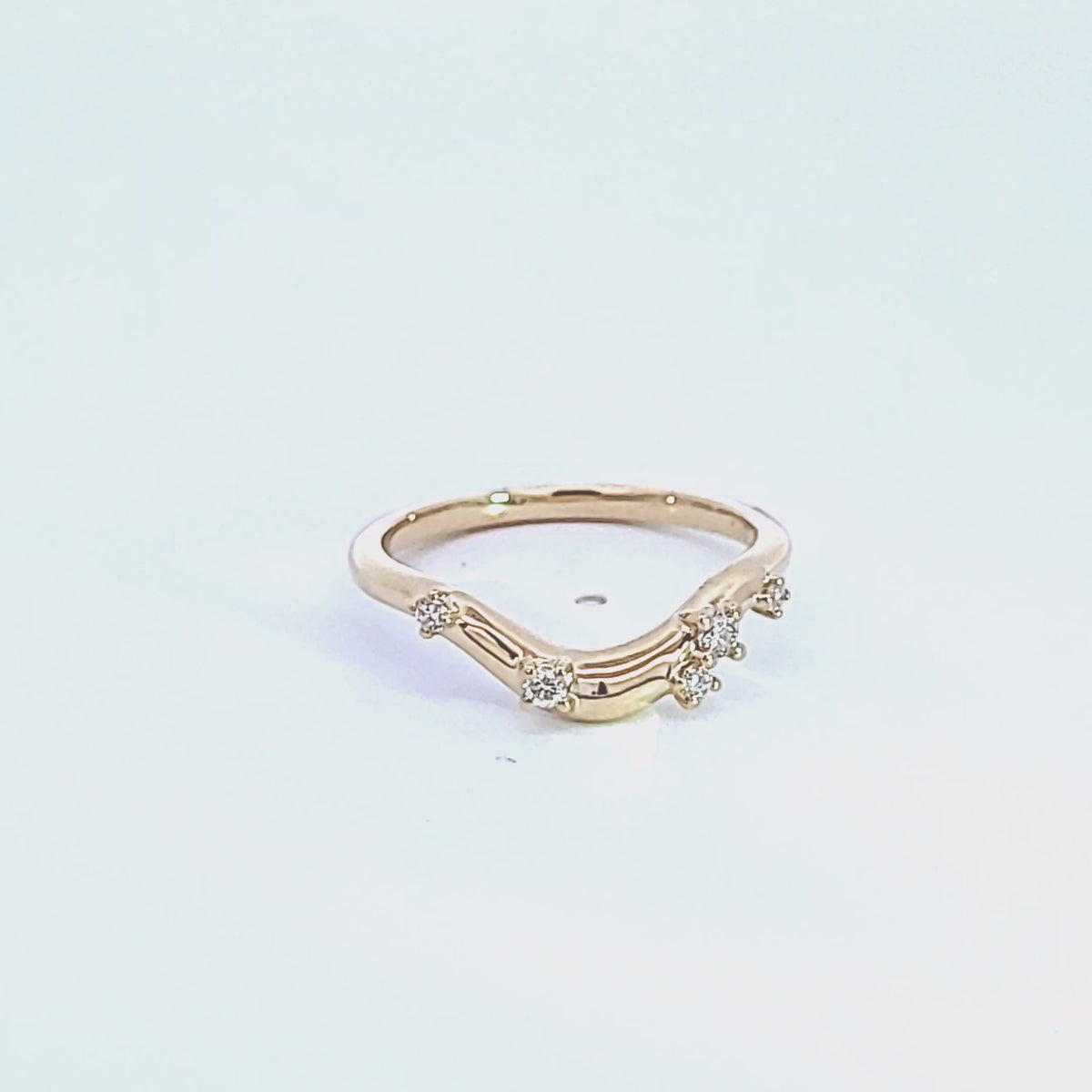 1/6ct. t.w. Curved Diamond Wedding Ring in 14K Yellow Gold