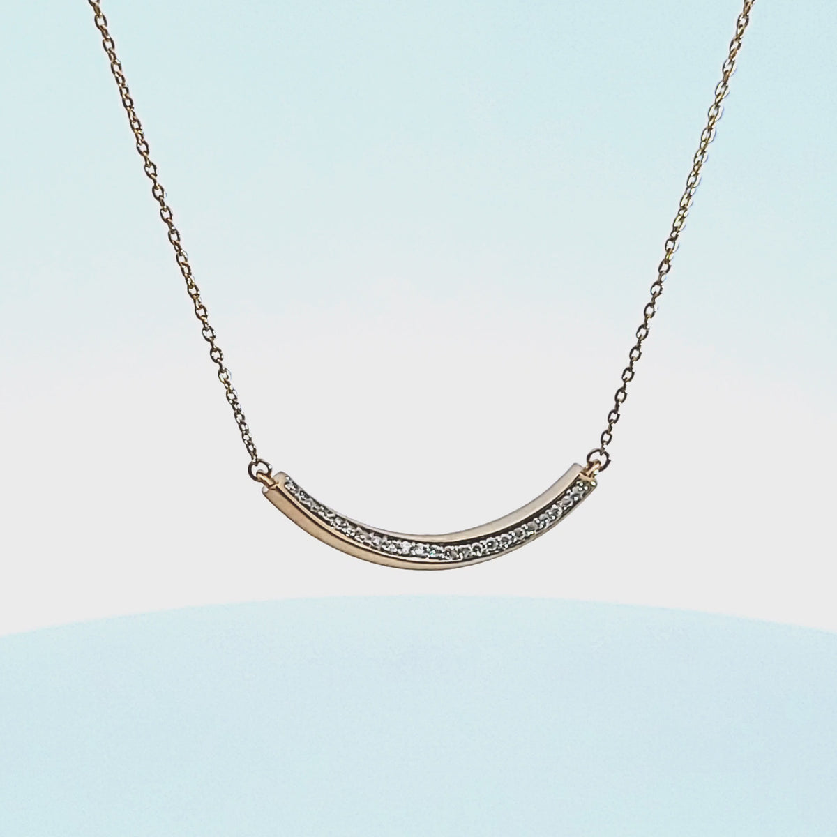 1/10ct. t.w. Diamond Curved Bar Pendant in 14K Yellow Gold