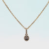 1/7ct. Brown Oval Cut Bezel Set Diamond Pendant in 14K Yellow Gold