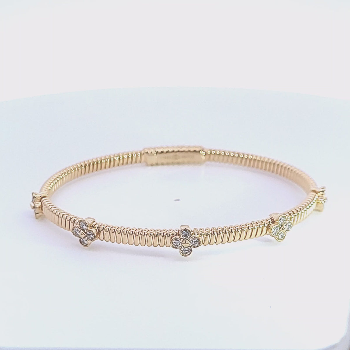 3/4ct. t.w. Diamond Clover Bangle Bracelet in 14K Yellow Gold