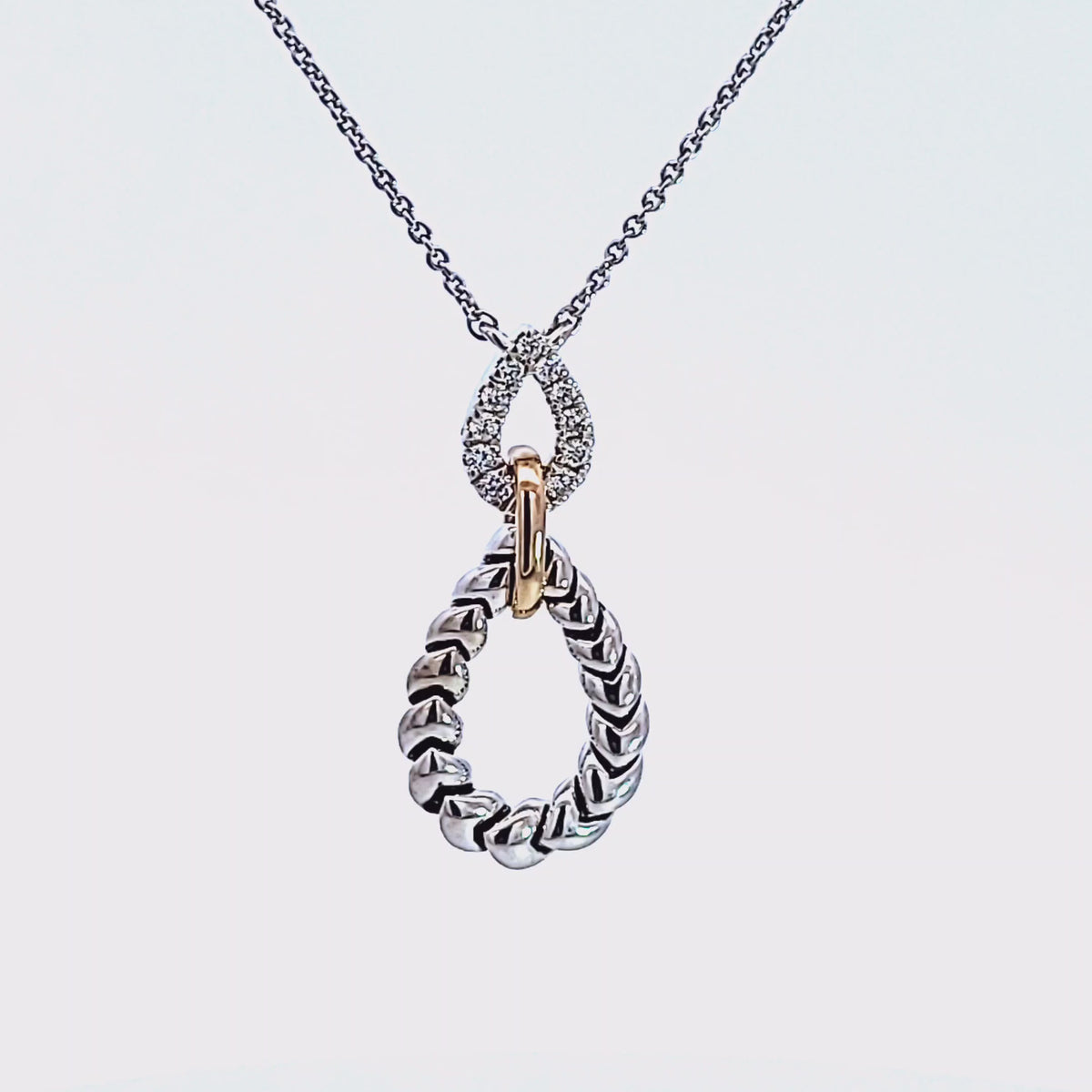 1/7ct. t.w. Diamond Drop Pendant in 14K Yellow Gold and Sterling Silver