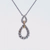 1/7ct. t.w. Diamond Drop Pendant in 14K Yellow Gold and Sterling Silver