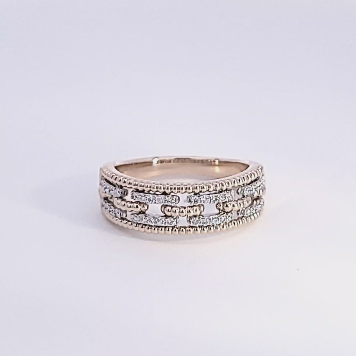 1/5ct. t.w. Round Cut Wedding Ring in 14K Yellow and White Gold