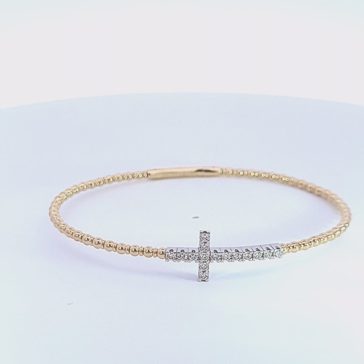 1/3ct. t.w. Diamond Cross Bracelet in 14K Yellow and White Gold