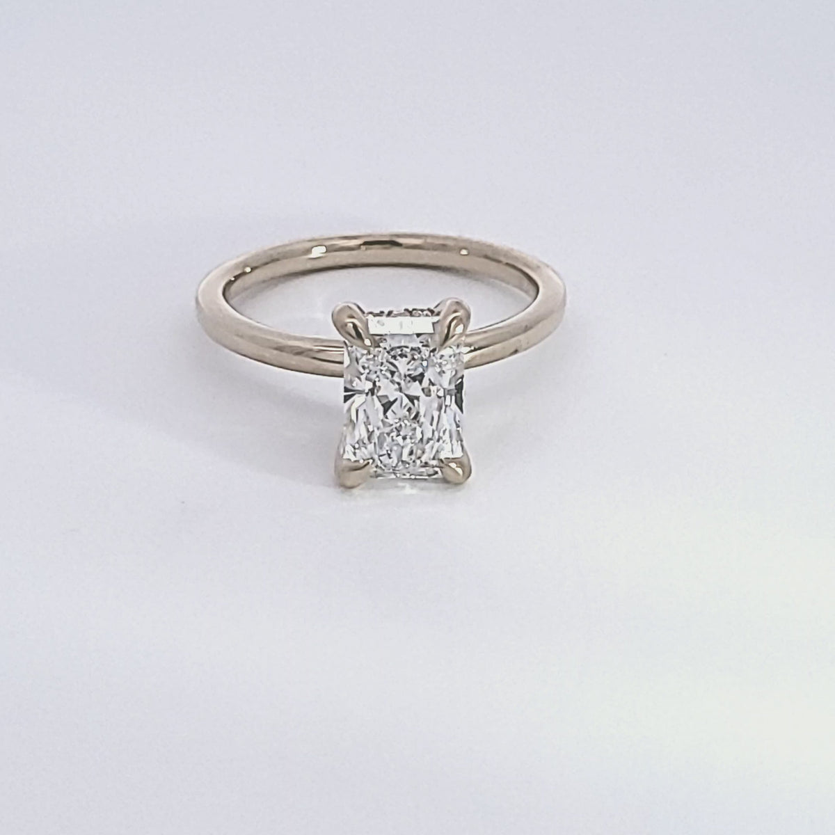 2 1/14ct. t.w. Radiant Cut Newborn Lab Created Diamond Engagement Ring in 14K Yellow Gold