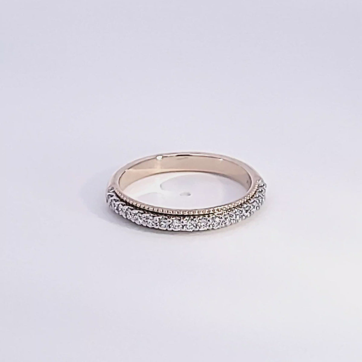 1/4ct. t.w. Round Cut Anniversary Ring in 14K Yellow and White Gold
