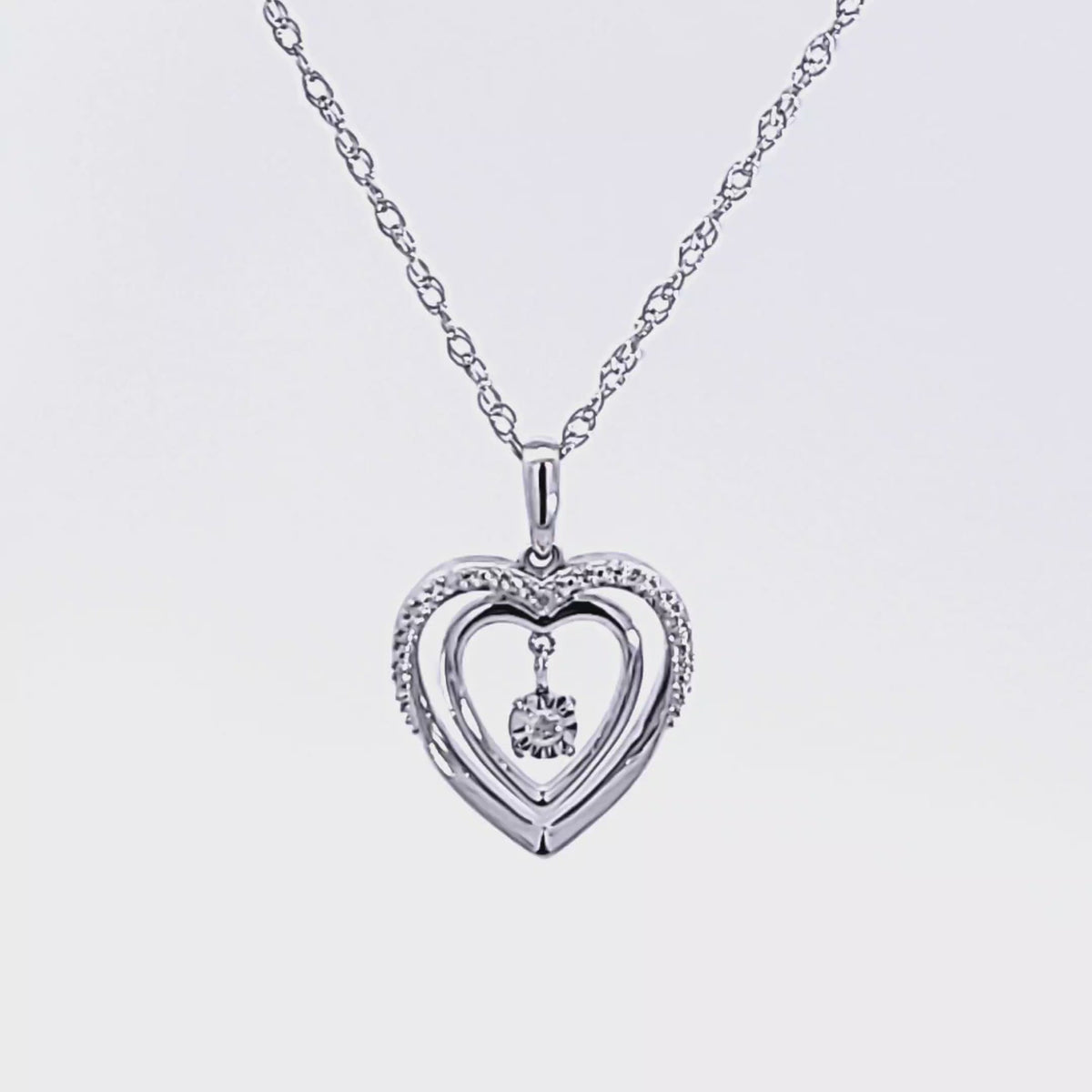 .03ct. t.w. Round Cut Shimmering Diamond Heart Pendant in Sterling Silver