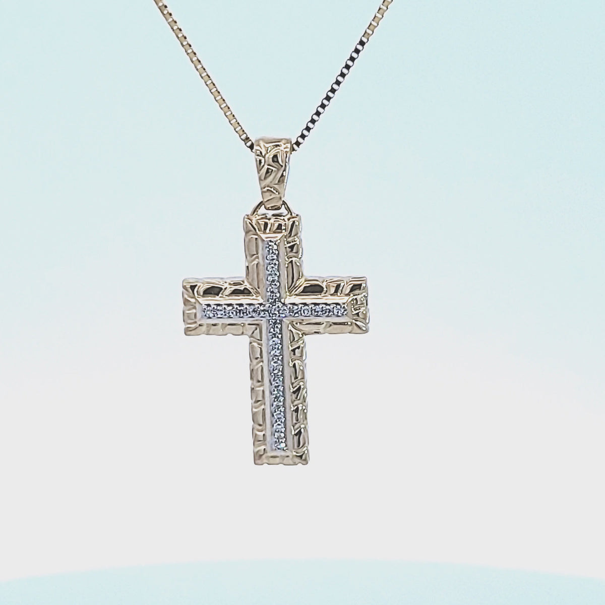 1/10ct. t.w. Diamond Cross Pendant in 10K Yellow Gold
