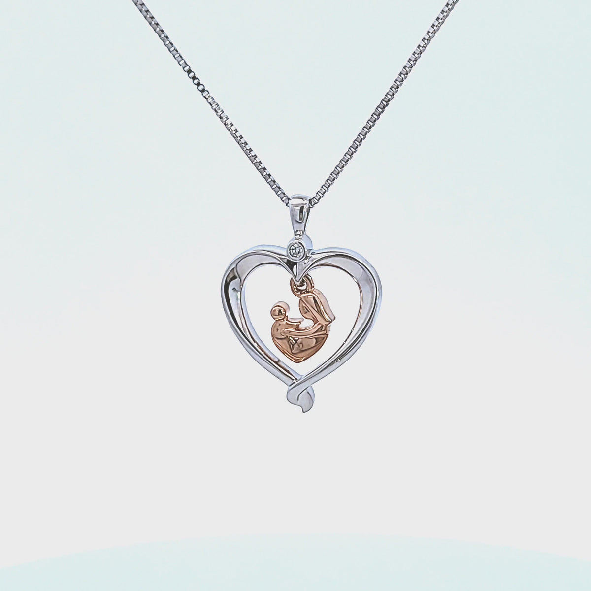 .01ct. Diamond Heart Pendant in 10K Rose Gold and Sterling Silver